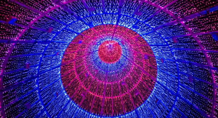 vibrant-array-of-lights-arranged-in-a-circular-pattern-on-a-dark-background