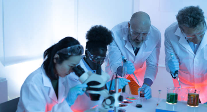 scientist researchers experiment in chemistry laboratory testing medicine