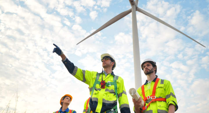 wide-perspective-of-wind-turbine-engineers-walking-2023-11-27-05-00-47-utc