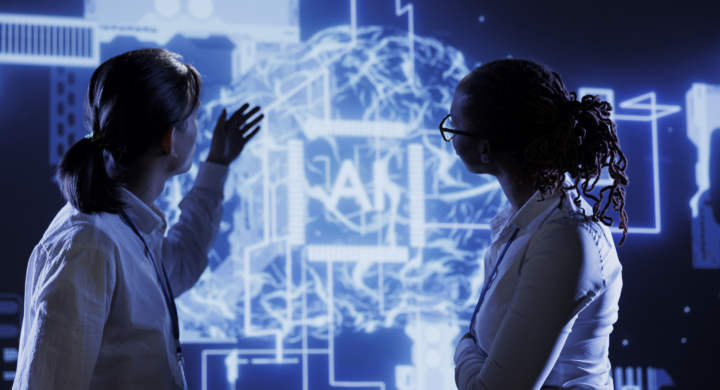 Hardworking colleagues developing artificial intelligence neural networks nodes modeled after human brain. Teamworking coworkers setting up AI machine learning accurately making predictions using data