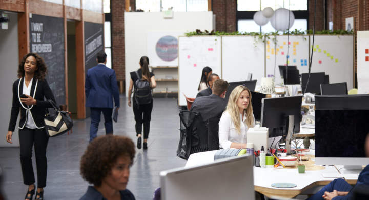 business-team-working-at-desks-in-modern-open-plan-office