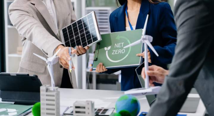 business team people planning and discussing on recycle reduce reuse policy symbol in office meeting room. Green business company and Solar Energy Environment city Concept.