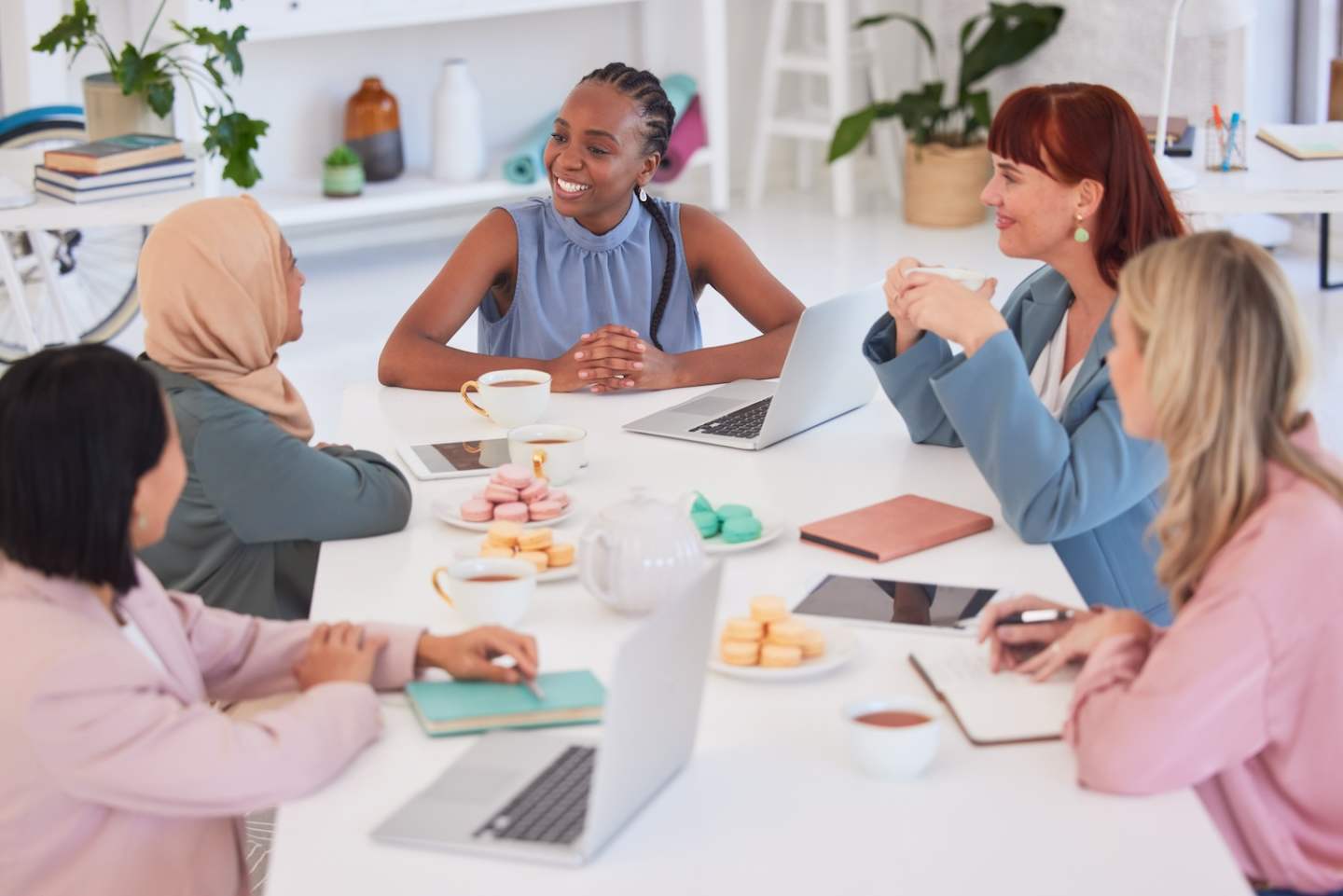Business people, diversity and meeting or social discussion in team building, planning or ideas at .