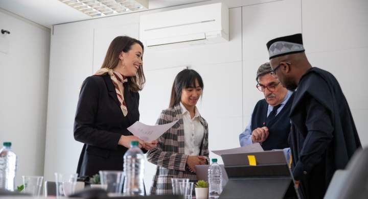 Business people discussing during a conference, international group