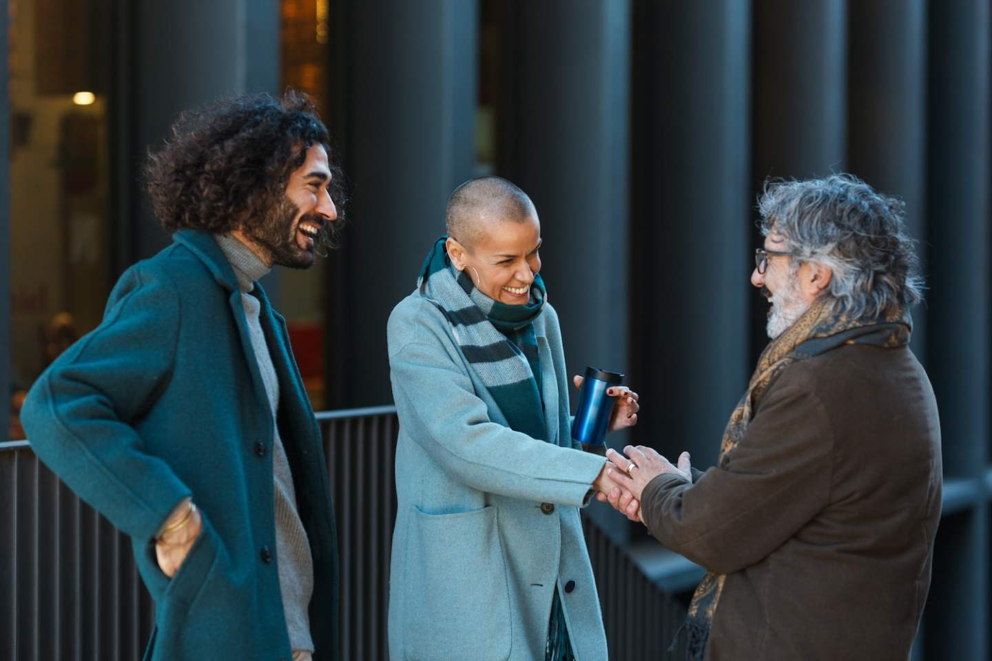 Professional business people talking and meeting on the street. Business, unity and teamwork concept.