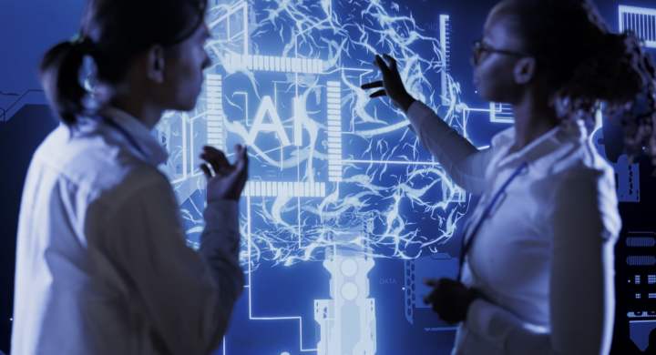 Qualified technicians brainstorm ways to use AI cognitive computing to extract usable information from complex data. Team of specialists implement artificial intelligence to process massive datasets