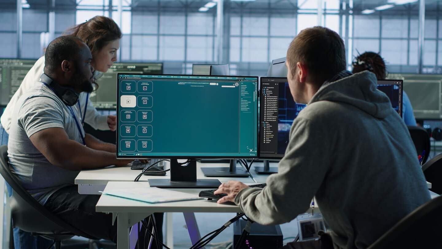Computer scientist in server room making software producing AI generated videos. IT specialist building artificial intelligence diffusion model app turning text prompts into clips, camera A