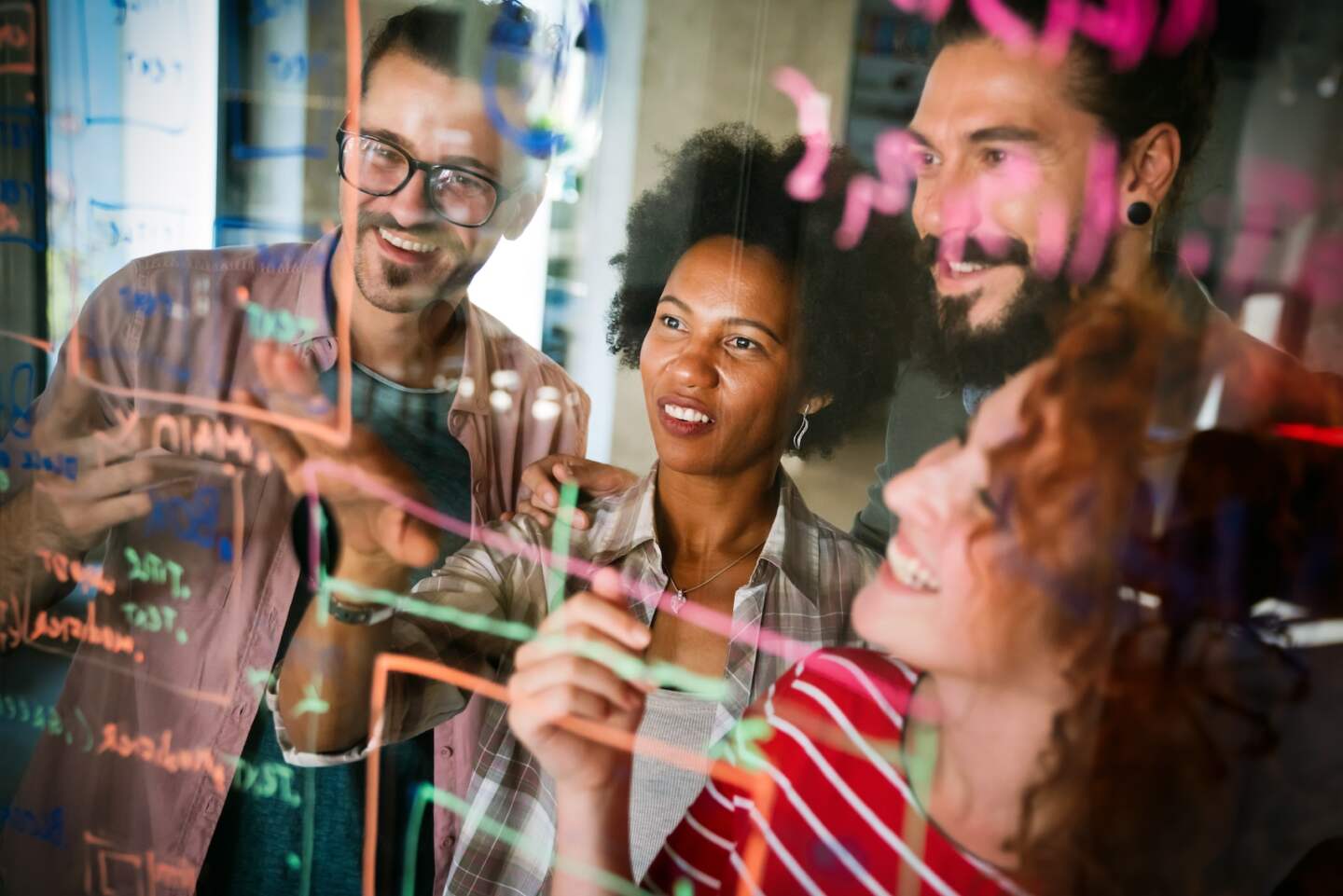 Group of young business people are working together in modern office. Creative successful hipster team in coworker office. Freelancers.