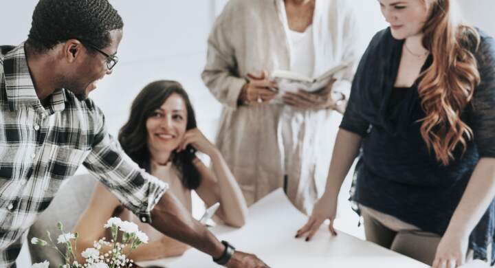Diverse business people working together