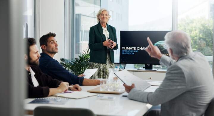 Climate change, meeting and question with business people in office boardroom for going green initi.
