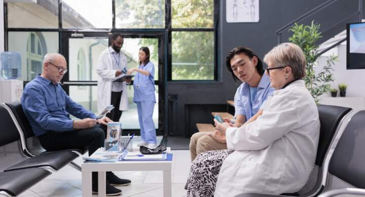 Physician doctor measuring glucose and insulin level with glucometer while doing sugar test for asian patient with diabetes. Having medical consultation in hospital waiting area. Medicine support